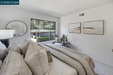 This home offers a peaceful retreat with abundant light and a on Rossmoor Golf Course in California - for sale on GolfHomes.com, golf home, golf lot