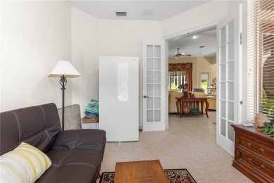 Nestled in the gated Harbor Hills community, this home offers a on Harbor Hills Country Club in Florida - for sale on GolfHomes.com, golf home, golf lot