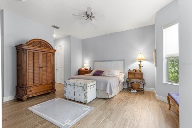 Nestled in the gated Harbor Hills community, this home offers a on Harbor Hills Country Club in Florida - for sale on GolfHomes.com, golf home, golf lot