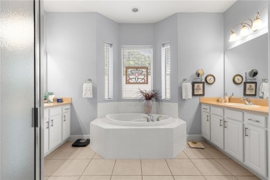 Nestled in the gated Harbor Hills community, this home offers a on Harbor Hills Country Club in Florida - for sale on GolfHomes.com, golf home, golf lot