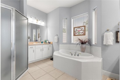 Nestled in the gated Harbor Hills community, this home offers a on Harbor Hills Country Club in Florida - for sale on GolfHomes.com, golf home, golf lot