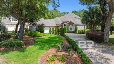 Discover coastal luxury in this former model home, meticulously on Peninsula Golf and Racquet Club in Alabama - for sale on GolfHomes.com, golf home, golf lot
