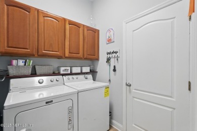Beautifully maintained 3BR/2BA home in the desirable community on St. Johns Golf Club in Florida - for sale on GolfHomes.com, golf home, golf lot