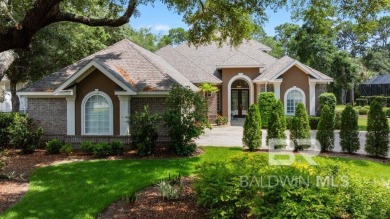 Discover coastal luxury in this former model home, meticulously on Peninsula Golf and Racquet Club in Alabama - for sale on GolfHomes.com, golf home, golf lot