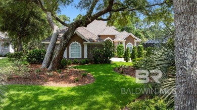 Discover coastal luxury in this former model home, meticulously on Peninsula Golf and Racquet Club in Alabama - for sale on GolfHomes.com, golf home, golf lot