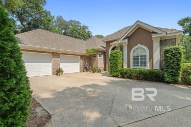 Discover coastal luxury in this former model home, meticulously on Peninsula Golf and Racquet Club in Alabama - for sale on GolfHomes.com, golf home, golf lot