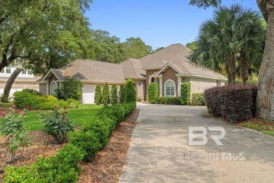 Discover coastal luxury in this former model home, meticulously on Peninsula Golf and Racquet Club in Alabama - for sale on GolfHomes.com, golf home, golf lot