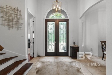 Discover coastal luxury in this former model home, meticulously on Peninsula Golf and Racquet Club in Alabama - for sale on GolfHomes.com, golf home, golf lot