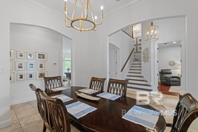 Discover coastal luxury in this former model home, meticulously on Peninsula Golf and Racquet Club in Alabama - for sale on GolfHomes.com, golf home, golf lot
