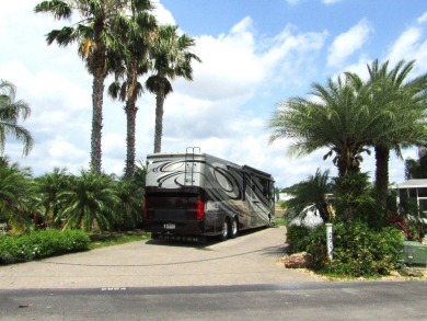 Located on the 15th fairway of the executive golf course at Deer on Deer Creek RV Golf Resort in Florida - for sale on GolfHomes.com, golf home, golf lot