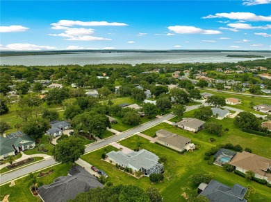 Nestled in the gated Harbor Hills community, this home offers a on Harbor Hills Country Club in Florida - for sale on GolfHomes.com, golf home, golf lot