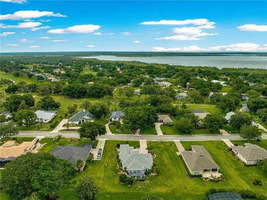 Nestled in the gated Harbor Hills community, this home offers a on Harbor Hills Country Club in Florida - for sale on GolfHomes.com, golf home, golf lot