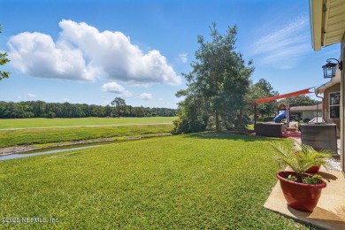 Beautifully maintained 3BR/2BA home in the desirable community on St. Johns Golf Club in Florida - for sale on GolfHomes.com, golf home, golf lot