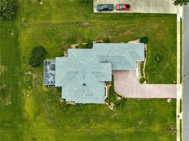 Nestled in the gated Harbor Hills community, this home offers a on Harbor Hills Country Club in Florida - for sale on GolfHomes.com, golf home, golf lot
