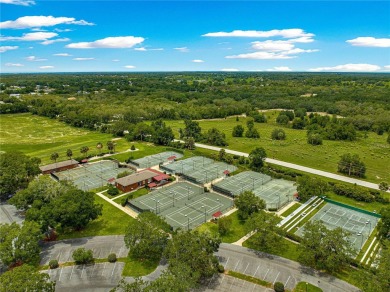 Nestled in the gated Harbor Hills community, this home offers a on Harbor Hills Country Club in Florida - for sale on GolfHomes.com, golf home, golf lot
