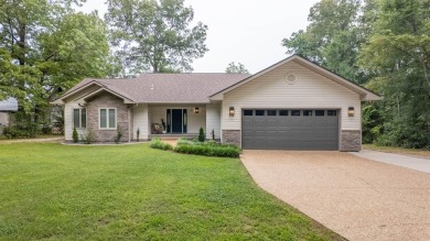 Lakefront Home in Cherokee Village, Arkansas - Waterfront Living on Cherokee Village North Course in Arkansas - for sale on GolfHomes.com, golf home, golf lot