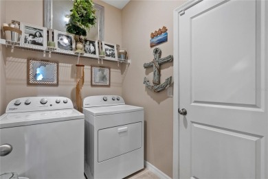 Welcome to exceptional lakefront residence showcasing thoughtful on Lakewood National Golf Club in Florida - for sale on GolfHomes.com, golf home, golf lot