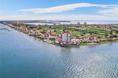 Embrace the epitome of Coastal Living on the 8th floor of this on Isla Del Sol Yacht and Country Club in Florida - for sale on GolfHomes.com, golf home, golf lot