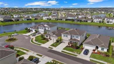 Welcome to exceptional lakefront residence showcasing thoughtful on Lakewood National Golf Club in Florida - for sale on GolfHomes.com, golf home, golf lot