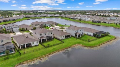 Welcome to exceptional lakefront residence showcasing thoughtful on Lakewood National Golf Club in Florida - for sale on GolfHomes.com, golf home, golf lot