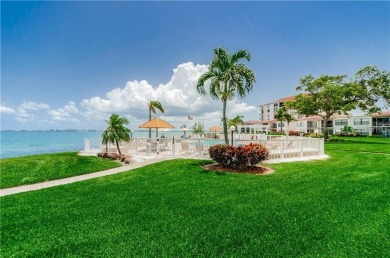 Embrace the epitome of Coastal Living on the 8th floor of this on Isla Del Sol Yacht and Country Club in Florida - for sale on GolfHomes.com, golf home, golf lot