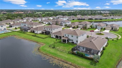 Welcome to exceptional lakefront residence showcasing thoughtful on Lakewood National Golf Club in Florida - for sale on GolfHomes.com, golf home, golf lot