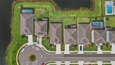 Welcome to exceptional lakefront residence showcasing thoughtful on Lakewood National Golf Club in Florida - for sale on GolfHomes.com, golf home, golf lot