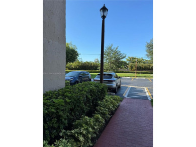 Corner unit on the first floor, additional light and windows in on  in Florida - for sale on GolfHomes.com, golf home, golf lot