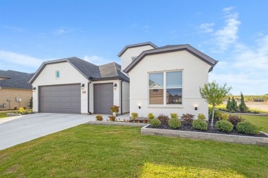 This stunning custom-built home, completed in 2025, showcases on Wildhorse Golf Club of Robson Ranch in Texas - for sale on GolfHomes.com, golf home, golf lot
