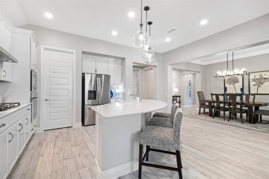This stunning custom-built home, completed in 2025, showcases on Wildhorse Golf Club of Robson Ranch in Texas - for sale on GolfHomes.com, golf home, golf lot