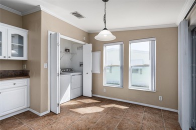 Well-Maintained 3BR Palm Harbor Home with New Roof & A/C! on Imperial Lakewoods Golf Club in Florida - for sale on GolfHomes.com, golf home, golf lot