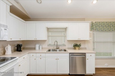 Resort-style living in this beautiful 3-bedroom,2 Bath  2 Car on Indian River Colony Club in Florida - for sale on GolfHomes.com, golf home, golf lot