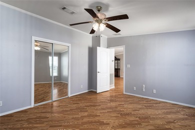 Well-Maintained 3BR Palm Harbor Home with New Roof & A/C! on Imperial Lakewoods Golf Club in Florida - for sale on GolfHomes.com, golf home, golf lot