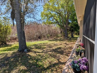 This 2 Bedroom 2 bath furnished RV resort home is situated on a on The Great Outdoors Golf and Country Club in Florida - for sale on GolfHomes.com, golf home, golf lot