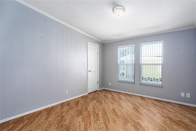 Well-Maintained 3BR Palm Harbor Home with New Roof & A/C! on Imperial Lakewoods Golf Club in Florida - for sale on GolfHomes.com, golf home, golf lot