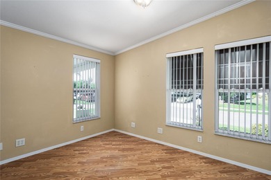 Well-Maintained 3BR Palm Harbor Home with New Roof & A/C! on Imperial Lakewoods Golf Club in Florida - for sale on GolfHomes.com, golf home, golf lot