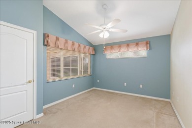 Resort-style living in this beautiful 3-bedroom,2 Bath  2 Car on Indian River Colony Club in Florida - for sale on GolfHomes.com, golf home, golf lot