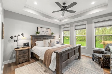 Welcome to your dream home in the beautiful Big Creek Valley on Tournament Club of Iowa in Iowa - for sale on GolfHomes.com, golf home, golf lot