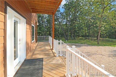 Step into the woods and back in time with this newly listed home on The Club At Old Kinderhook in Missouri - for sale on GolfHomes.com, golf home, golf lot