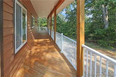 Step into the woods and back in time with this newly listed home on The Club At Old Kinderhook in Missouri - for sale on GolfHomes.com, golf home, golf lot