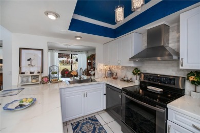 ENDLESS GOLF COURSE and LAKE VIEWS, most private and serene on Twin Isles Country Club in Florida - for sale on GolfHomes.com, golf home, golf lot