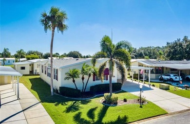 Well-Maintained 3BR Palm Harbor Home with New Roof & A/C! on Imperial Lakewoods Golf Club in Florida - for sale on GolfHomes.com, golf home, golf lot