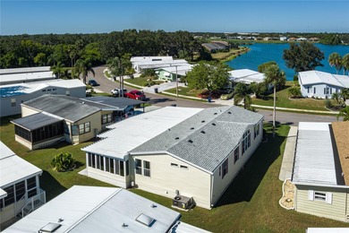 Well-Maintained 3BR Palm Harbor Home with New Roof & A/C! on Imperial Lakewoods Golf Club in Florida - for sale on GolfHomes.com, golf home, golf lot