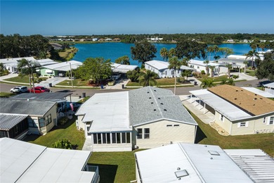 Well-Maintained 3BR Palm Harbor Home with New Roof & A/C! on Imperial Lakewoods Golf Club in Florida - for sale on GolfHomes.com, golf home, golf lot