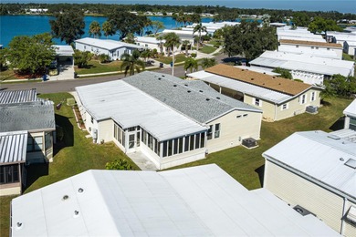 Well-Maintained 3BR Palm Harbor Home with New Roof & A/C! on Imperial Lakewoods Golf Club in Florida - for sale on GolfHomes.com, golf home, golf lot