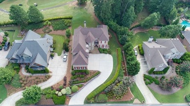 Experience luxury living at its finest with this stunning on Collins Hill Golf Club in Georgia - for sale on GolfHomes.com, golf home, golf lot