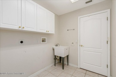 Resort-style living in this beautiful 3-bedroom,2 Bath  2 Car on Indian River Colony Club in Florida - for sale on GolfHomes.com, golf home, golf lot