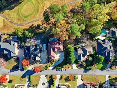 Experience luxury living at its finest with this stunning on Collins Hill Golf Club in Georgia - for sale on GolfHomes.com, golf home, golf lot