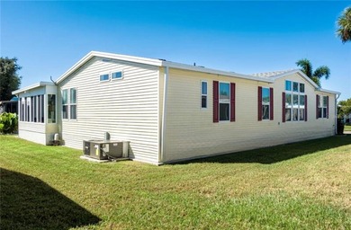 Well-Maintained 3BR Palm Harbor Home with New Roof & A/C! on Imperial Lakewoods Golf Club in Florida - for sale on GolfHomes.com, golf home, golf lot