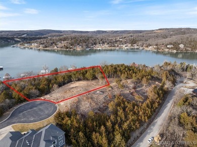 Nestled in the Old Kinderhook Golf Course community, Lot 32 on The Club At Old Kinderhook in Missouri - for sale on GolfHomes.com, golf home, golf lot